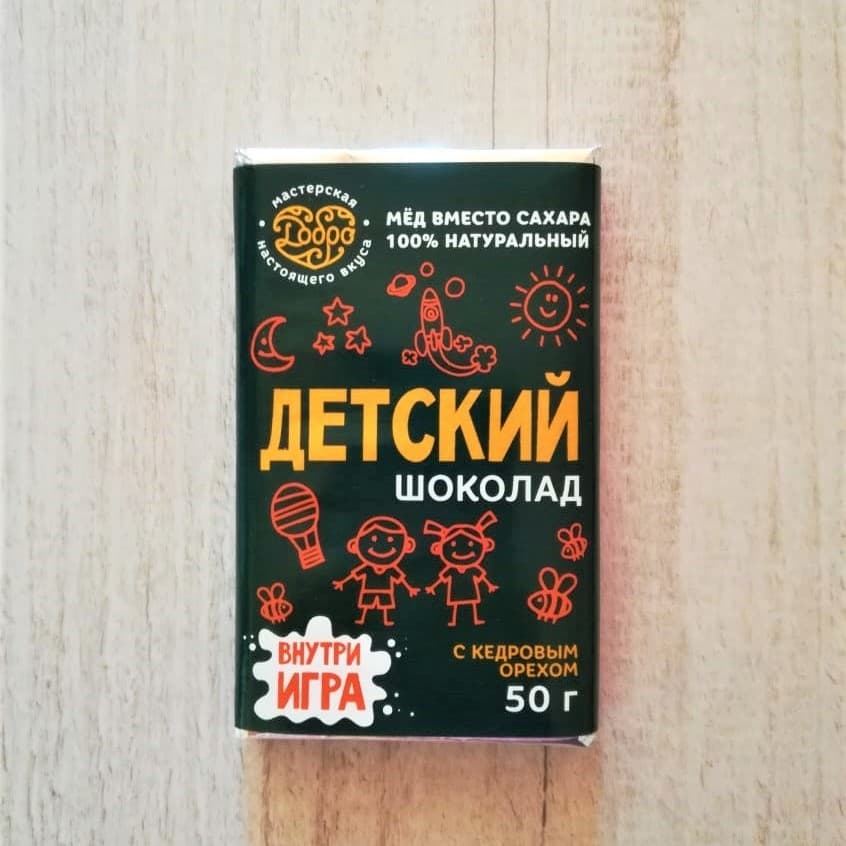 Детский шоколад молочный, 54% какао на меду с кедром